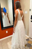 This dress is so beautiful! It fit better than most dresses I've ever tried on and I really love the bright white contrast of the the design on the skirt. It has the perfect amount of poof. The length is perfect without needing it hemmed. I am 130lbs for reference. - Nicole A.