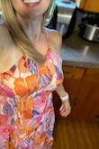 This is definitely my favorite dress that I've purchased from Lulus! I was a bit hesitant since there were no reviews, but I'm so happy with this dress. The pattern is gorgeous. It is lined and very comfortable. There isn't a zipper, but the elastic waist and adjustable tie at the neck help to customize the fit. My one critique is that the slit in the middle of the chest is so long that it will show most strapless bras. A safety pin or dress tape is an easy fix. Super pleased with this one! - Lisa K.