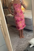 I normally purchase a dress in a size small or 6. This medium was too tight in my hips and butt. The bust was way too big.  The print and style are beautiful but the fit was not right for me. - Maura B.