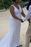 Bought this dress literally at the last minute to replace my original wedding dress. Fits perfectly and was super comfortable. The dress has just the right amount of stretch and simple elegance for a beach wedding - or any wedding. Loved the neckline and lace details at the back and sides too - looks good in pictures. - Louisa P.