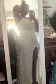 Love the dress but it did not fit me because the split was too long. My kitty was out the door since I have a lot of hips and curves. - Shermaine R.