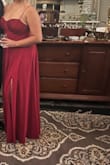 Material is lovely. I always forget how my sweat stains show up in red dresses but no one noticed. The waist is nice and form hugging. The hem line was all over the place when I brought it in to be altered. Love that the cups were thick so I didn't have to wear a bra. I didnt love that the top hem would roll out a bit and show the inside fabric. Overall satisfied with this dress. - Monica W.