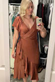 I ended up picking a different Lulus dress for the event I was shopping for but I rely on these review photos when ordering for real person fit so I wanted to review anyways. This dress fit very well, the fabric and color was so pretty and it was very forgiving. Definitely would order again. Ps the color is not as dark as my picture. - Jessica B.