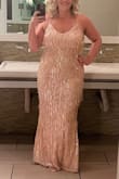 The dress fit very nicely and formed well into my body without being too clingy. You have to get a bra that goes down far in the back or has a clear strap as you can see with the criss-cross straps. The dress was lined nicely so not see-through either. - Kristi B.