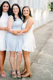 The slightest bit see-through in the chest area but this wasn't a problem for me because I wore boob tape. I LOVED this dress for graduation pictures! - Raven P.
