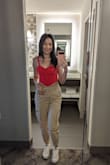 According to the other reviews, it mentioned that the shirt ran a little small so I sized it down and it's a good thing I did because the Xs fit perfectly. The small would have fit but the bust area would have been a little too big on me as I am all-chested. I love this top it's so cute. You can definitely dress it up or down! Hopefully, it comes back in more colors! The material is not thin, it's kinda thick which I like, and seems like a good quality shirt. - Maiseely T.