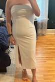 This dress is cute but was not super flattering on me. It is also very heavy and the bow requires an extra person to snap it on. - Rachel M.