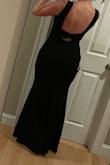Fits true to size and is incredibly flattering! I ordered the black and felt super confident all night! I'm 5'6, wore two inch heels, and didn't need to hem at all!  Bonus points for not needing to wear a bra with this!! - Morgan D.