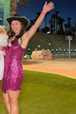 This is very flattering and perfect for a bachelorette party in Vegas! I definitely stood out in the pink sparkles and it fit really well! It has stretch to it. - Chelsea C.