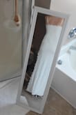 I'm wearing this dress to my reception, but I almost like it more than my ceremony dress. It's so lightweight and soft. I love the slit, it gives it a bit of a sexy edge but not too much. It is a bit long, so one or two-inch heels work perfectly. It zipped up perfectly but was a bit loose in the belly, so it might even work If you were a few months pregnant. Go for it! - Angela T.