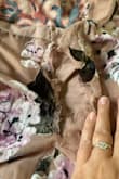 I am in love with this dress but the first time I wore it (wedding guest) the sheer outside part ripped and the hole just got bigger and bigger throughout the night. It fit perfectly so I was so sad when it ripped so easily! - Lauren B.