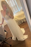 This dress is perfect! I first ordered a small and it was a tad too small, I then exchanged it for a medium and it fits perfect! Just very long so I will definitely need a hem. Looks like a $2,000 dress, so beautiful! Cant wait to get married on the beach in this dress! - Kailee C.