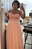This dress is absolutely beautiful. The contrast of the fabric works well in all lighting. The only thing I would suggest is that you get the dress hemmed if you are on the shorter side. - Denise M.