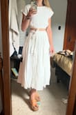 I changed into this after our small, outdoor wedding ceremony. It was so nice and cool after the other dress! It looked much better than this pic after being steamed. I didn't have time to exchange for a Small but that may have been a better fit on the bottom. The XS skirt dug into my back a little bit, but actually didn't notice it much. It would be nice to be able to order a different size in the top and bottom! - Zannah P.