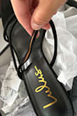 One of the shoe straps wasn't secured properly and was falling off as soon as I took it out. - Majesta V.
