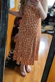 Love this dress and got ton of compliments. My only issue was after I adjusted the straps (retied tighter I felt paranoid that they were coming undone, they weren't though. - Brittany A.