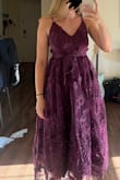 This dress felt like good quality, especially for the price, but was super unflattering on me. There is too much tulle in the waist/belly area and it made my stomach look way bigger. Big no from me but might work on other body types! - Anna L.