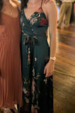 I bought this dress to wear for a wedding. The material was smooth and silky, and quite heavy, so it hung nicely. Very long though (at least 3 inches too long, even while wearing 3-inch heels), so I had to get it hemmed. I wish the straps were a bit thicker, as the dress was heavy so it pulled the top down a bit, but I wore sticky bra cups which worked well. Overall, I was very pleased with the dress! - Elizabeth B.