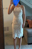 I bought this for my bridal shower! Normally I'm in between sizes small and medium. I know I didn't want it to be super tight so I went with a medium and glad I did! - Ally R.
