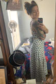 This dress fits true to size. I'm a 6, ordered a medium. Super comfortable, great quality, & don't have to wear a bra which is always a plus. It's extremely flattering & versatile when going from a summer day to evening. - Carissa K.