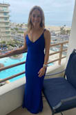 I bought this dress for a black tie wedding in August in Southern California. The dress is a very heavy material and therefore was a little too warm for the time of year and outdoor venue. Other than that, it's adjustable straps were helpful so I didn't have to get the dress hemmed, but it ran long, so if you plan to wear flats you may need to get it altered if you are my height or shorter. The color was great and it ran true to size. - Noelle N.