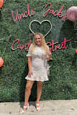 This dress was super cute and such great quality! It fit me snugly but was great with a pair of spanx haha. It was adorable and I got a lot of compliments. The length was great on me too, not too short at all. - Alexis W.