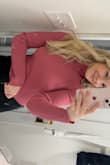 This sweater is one of my favorites. The color is fun and the sweater is a great length. It's not cropped but not too long either. - Heather R.