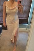 This dress isn't too bad. After steaming, it is silky, thinner fabric with a glossy shimmering pattern. The color is nice too. However, this is a very body specific dress. The dress is long, almost to my ankles for my height. The waist is synched, but there's no fabric stretch so if you don't have a model flat tummy it will show even though it isn't tight. I'd say this dress is for fit, tall women. I have a large bust and hip measurement, so the dress fit me well but it just doesn't do my height and mid any justice. - Vivian F.