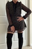 I ordered a large. The dress runs a tiny bit small but overall fits great. I seriously LOVE this dress. It's beautiful. - Amber A.