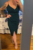 This dress is stunning, so comfortable, and super flattering. I'll be adding shapewear for the day of the wedding but I don't have any on in this photo. Also, if it wasn't stretchy I would've had to go up to a large. The color is beautiful. - Beth S.
