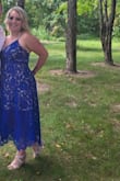 I'm in between sizes so originally ordered a medium but decided to exchange for a large. Was a little too snug on the hips and mom pouch. The large fit perfectly. The dress is absolutely beautiful and received compliments on it all evening. The underlay is a light tan just so the next person ordering knows. I couldn't tell if it was tan or white. Again love the dress. And the exchange went so smooth. Will def keep ordering from Lulus. - Brittany C.