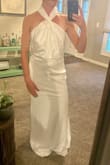 Fits great and is comfortable, doesn't run as long as some other Lulus dresses I've ordered. The material is very lightweight but felt more casual and costume-like than some of the other dresses. - Shelby J.