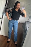 I loved! It's a very light fabric but made me feel warm, I don't know if is good to wear in summertime, but fits beautifully. 
It was just a little tight in my arms, but I like it, I have large arms anyway. When I wear it I always receive good compliments. - Emanuelle A.