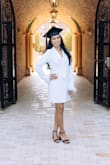 I was skeptical about ordering this due to other sizing reviews, but in my experience, it runs a little bigger. The belt made it less noticeable. The material is thick and not see-through at all. The feathers add the perfect touch. - Stephany R.