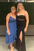 True to size and very flattering. The slit isn't too high and the dress was overall comfortable throughout the night. The boning did rub under my armpits and caused rub burns/sores but beauty is pain. I received lots of compliments. - Tara N.