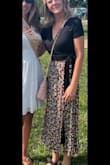 I love this top! I wore it with a skirt, but it could go with anything. It's super stretchy and low-cut but not too low. Got lots of compliments. Buy it! - Kristen V.