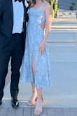 I absolutely love this dress; it fits perfectly. I'm quite petite and have a smaller chest and I found this dress to fit my shape and chest very well while also giving shape to my non-existent hips. Highly recommend! I got compliments all night. - Melanie W.
