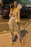 Really loved this romper. After reading the reviews I decided to size down and I'm very glad I did. It was the right amount of loose while still giving me some shape.
I have a long torso so it definitely rode up a bit but I expected that with the smaller size. - Siobhan L.