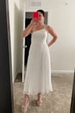 High end quality! I love this dress! I couldn't believe the fit. Its roomy in the stomach area but form fitting in the bust, very comfortable. - Melissa M.