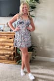 This dress hit all the boxes for my daughter's first HOCO dance! The colors are amazing and just happened to have all her school colors in it. The fit is great and very flattering without showing too much. Was Dad approved! - Kirby G.