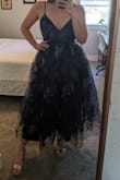 Agree with the other review. This dress is has way more poof than is pictured and creates a much larger silhouette compared to the model. The fabric was really pretty, but found it impossible to reduce the excess poof. Nice design in concept but did not deliver on execution. - Jess V.