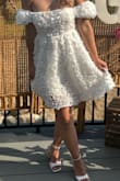 The perfect dress for a bridal shower! I had so many compliments and my grandma was brought to tears when she saw me because I looked like "a real bride!!!" haha

The sleeves can be worn above shoulders or off the shoulder (I wore off the shoulder) and it was so flattering. Was comfortable and breathable even on an 82 degree day. Couldn't love this dress more and wish I could have 20 more bridal events to wear it to :) - Brielle G.