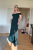 Thank the Gods or the heavens or whatever for this gown. I don't know if it's on purpose or not, but most bridesmaid dresses make you look squat, out of shape, and terrible. This one hugs my curves and slims the parts it's meant to. I have athletic arms and this gown hides some of their thickness. It's great. Highly recommend it for my short, athletic queens! - Melanie S.