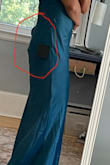 I love the color and overall the dress is beautiful--from the front. Other reviews have mentioned this issue too: the zipper in the back is extremely long and it is sewn in such a way that it sticks out no matter how much I try to straighten it out. I've included a picture where the lump is clearly visible. I have no idea why they use such a long zipper, I can take the dress on and off unzipping it only halfway. I considered replacing it with a shorter zipper and sewing the backup higher because I do love the dress, but in the end, it wasn't worth the effort and extra expense. I'm returning it. - Marina K.