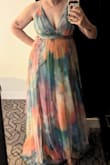 Gorgeous dress! I got so many compliments at the wedding I attended in Vegas! It's definitely long but that meant I could wear comfortable shoes with it and they didn't show. - Jessica G.