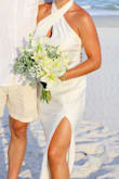 Bought this for my (last minute) elopement at the beach. It was perfect for my purposes. The strap that goes around the neck was a bit large, so I did have to alter it, but otherwise it was great. Received LOTS of compliments. - Amy J.