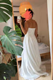 I love the dress. It runs a little big but overall, it's more than I could wish for. I've been looking for a dress for a long time for my wedding and I'm glad to say I'm done. The fabric is pretty good and not cheap. The dress is really long so you can adjust to your needs. I really recommend it. - Mai R.