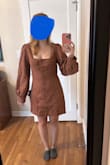 The sleeves are so long!  You can kind of tell on the model but on me, the sleeves felt too voluminous and way too long. I was so excited about this dress and thought it could be good on another body shape. I'm normally a size 4 and the medium was just big enough for my hips but too big on top. Maybe I could have gone to a small but even the medium was pretty short. Returned. - Allison S.