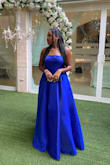 Dress was true to size and tall girl friendly. The color is beautiful & it fits nicely around the waist. - Gabriela R.
