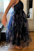 The amount of tulle on this dress is outrageous. It's extremely unflattering and extremely ugly. I never review items but had to save someone from this dress. - Ellen F.